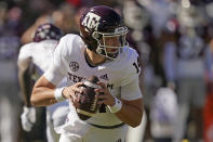 Texas A&M quarterback Max Johnson (14) looks for an open receiver during the first half of an NCAA college football game against Mississippi State in Starkville, Miss., Saturday, Oct. 1, 2022. (AP Photo/Rogelio V. Solis)