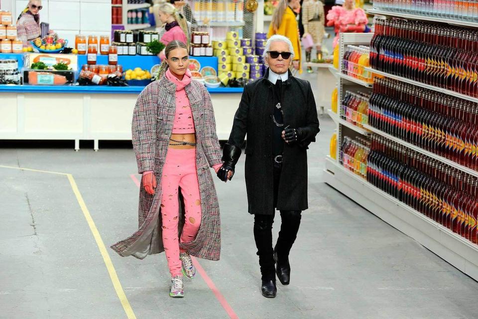 <p>Possibly the most iconic catwalk show to date, the Chanel supermarket was a shopping experience like no other. Shelves upon shelves of Chanel product was on displace from washing up powder to lemonade. (Where did it all go afterwards?) as models hit the Grand Palais with trolley in tow stocking up on the essentials. </p>