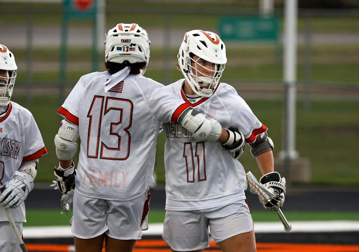 Tecumseh's Jude Broussard congratulates Luke Dunham after a goal during Wednesday's matchup against Chelsea.