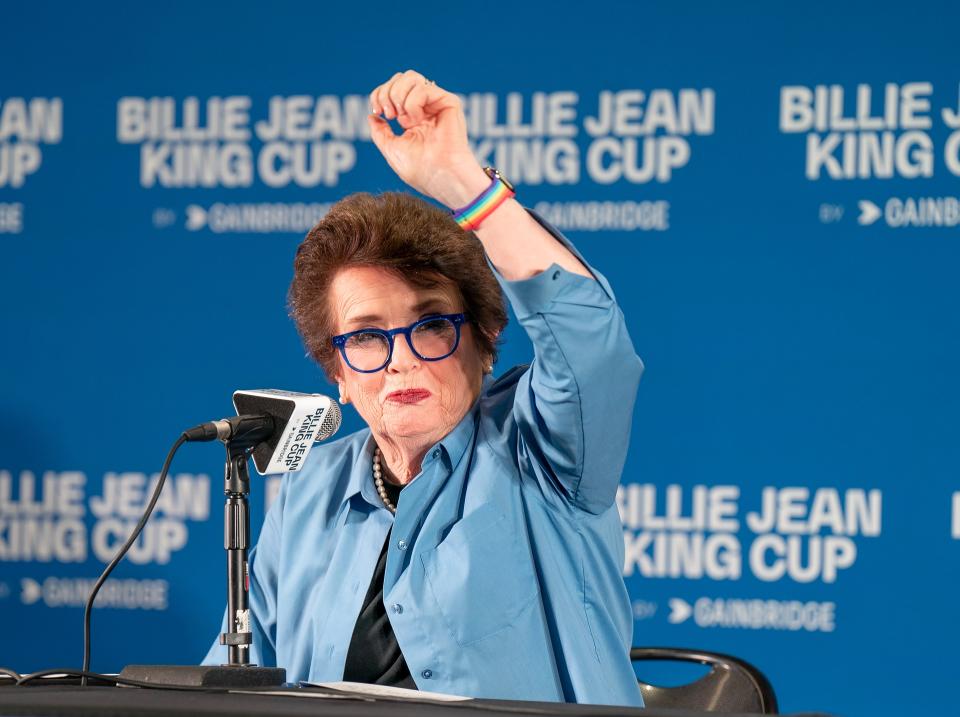 Billie Jean King speaks to reporters Friday at the Billie Jean King Cup at the Delray Beach Tennis Center. She is showing her rainbow-stripe watch, an accessory she said would not set well with Gov. Ron DeSantis. 'We must be bothering him,' she said. 'I have my rainbow watch on today.'