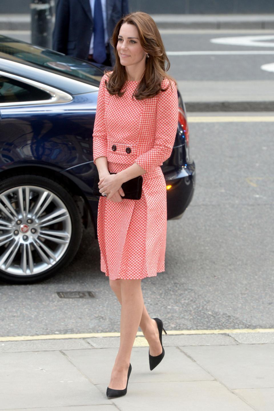 <p>This red-and-white gingham look was a firm favourite among Kate's fashion supporters. From Eponine London, the elegant two-piece was worn with black Gianvito Rossi heels and a Stuart Weitzman clutch. <i>[Photo: PA]</i> </p>