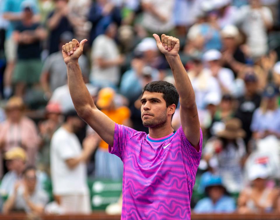 Carlos Alcaraz celebrates his match win over Felix Auger-Aliassime during round three of the BNP Paribas Open in Indian Wells, Calif., Sunday, March 10, 2024.