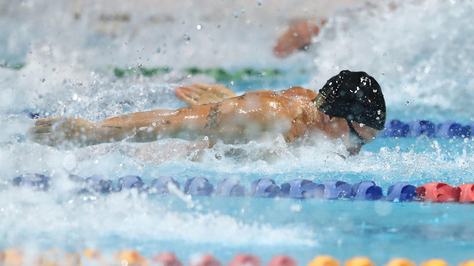 Pictured here, Cody Simpson races in the 50m butterfly at the Australian Swimming Championships.