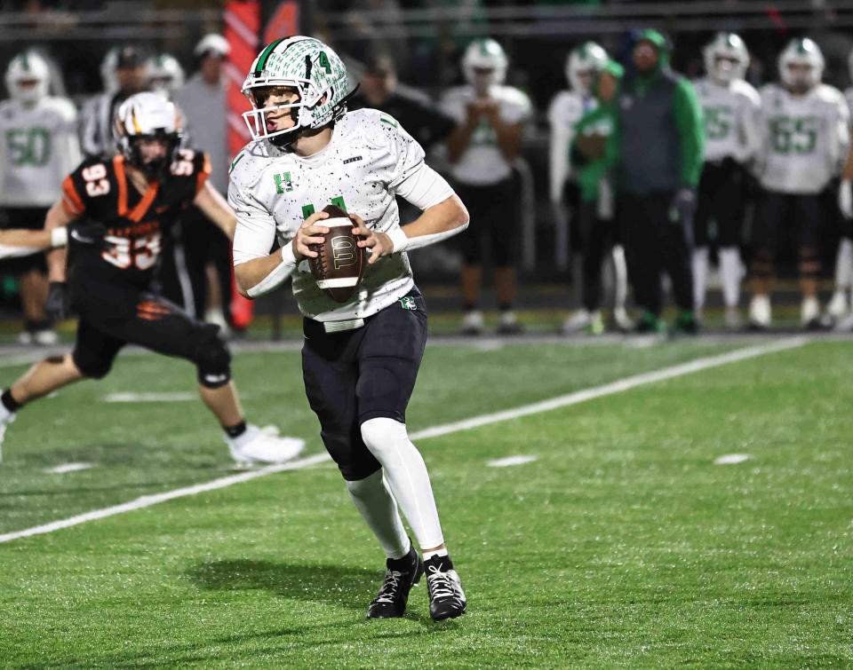 Harrison quarterback Dickie Engel (4) looks to pass during the Wildcats playoff game against Anderson Friday, Nov. 10, 2023.