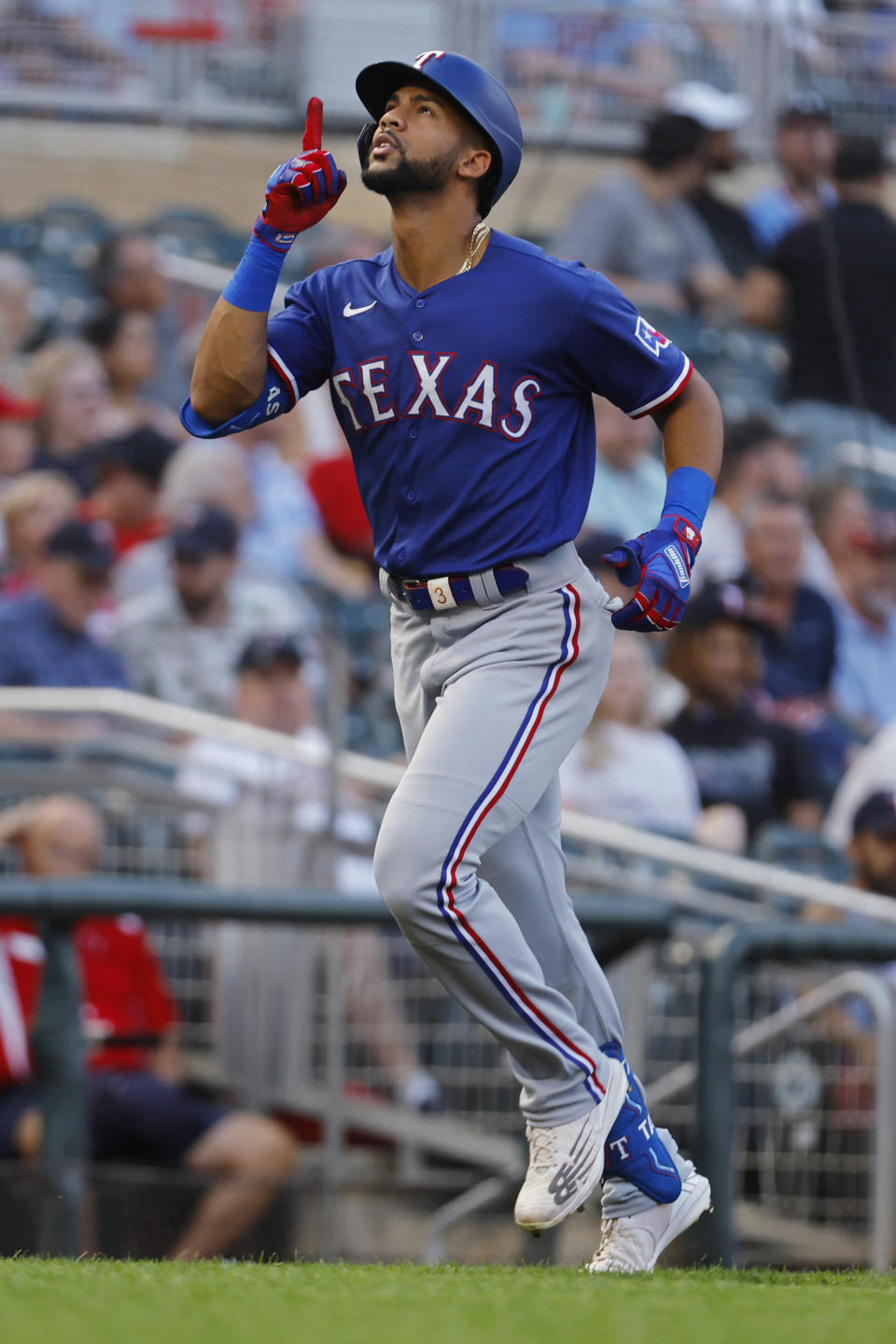 Texas Rangers' Leody Taveras runs the bases on his solo home run against the Minnesota Twins during the fourth inning of a baseball game Thursday, Aug. 24, 2023, in Minneapolis. (AP Photo/Bruce Kluckhohn)