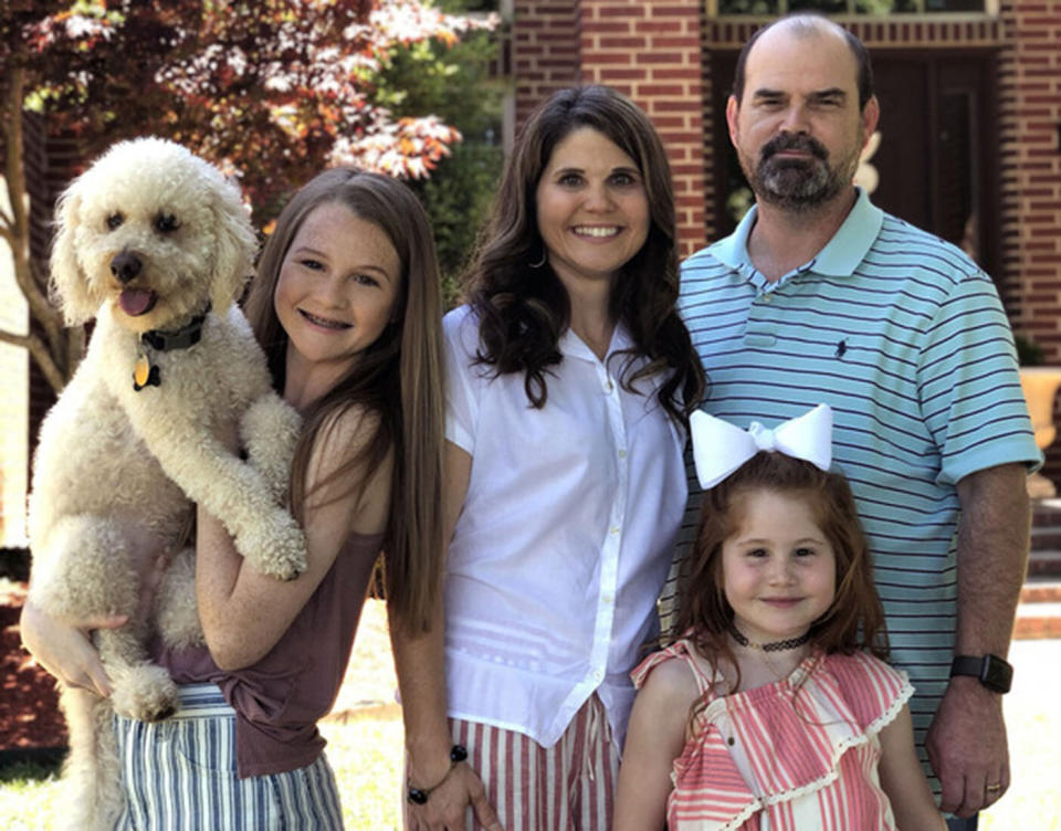 (From left) Dog Charlie with his family, Marcie, Jenee, Paige, and Jamie Clayton. Source: Caters