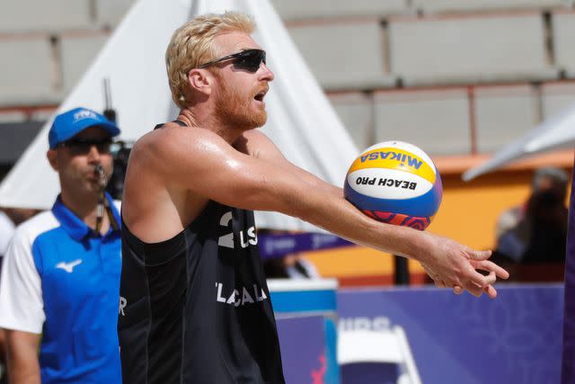 <p>Essene Hernandez/Eyepix Group/Shutterstock</p> Chase Budinger of United States competes against team Mexico during the Beach Volleyball World Cup Men's match between USA and Mexico. on October 10, 2023