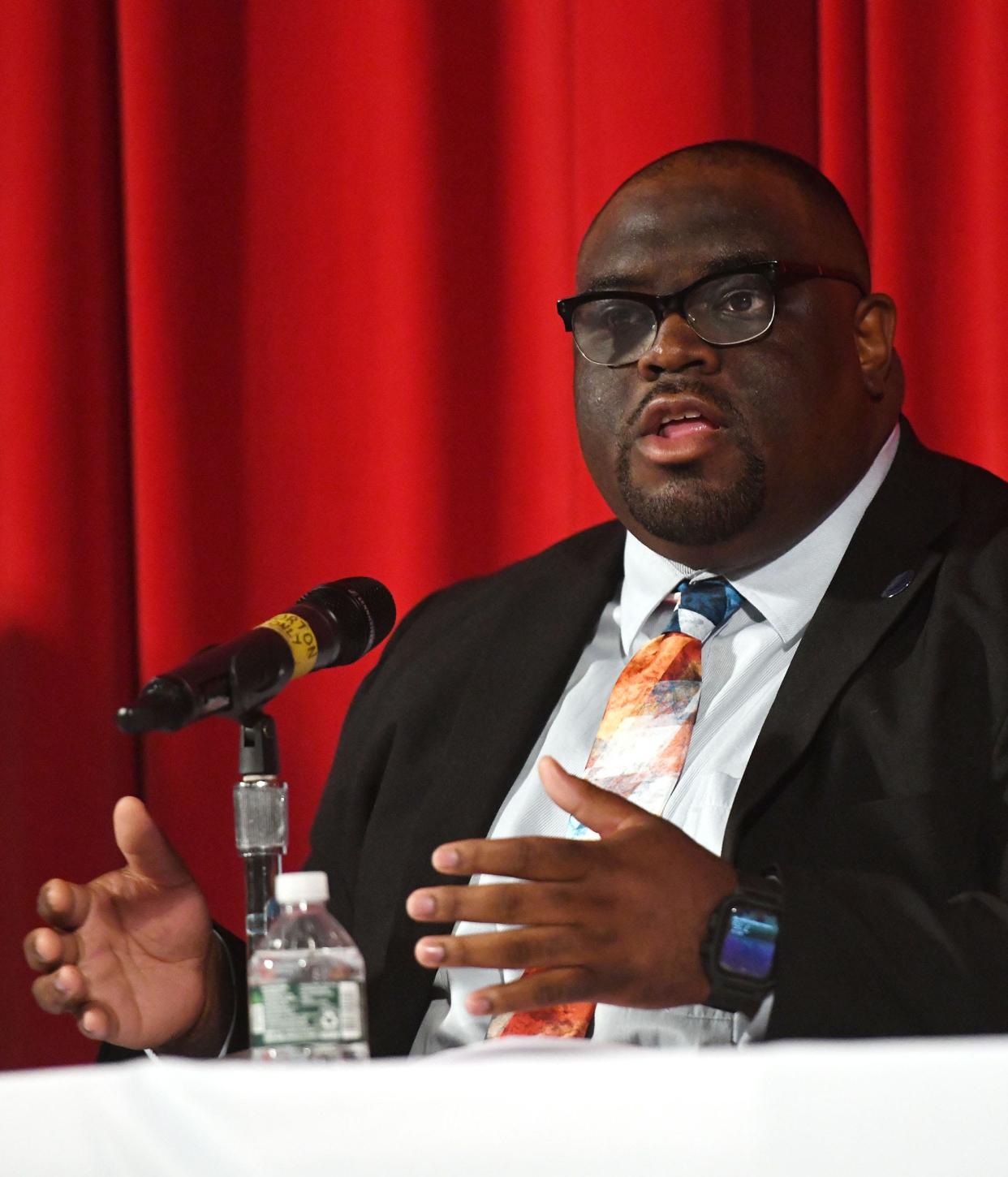 Derell Wilson, a Democrat running for the 46th House district seat, debates Republican candidate Robert Bell, Oct. 19, 2022 at Norwich Free Academy.