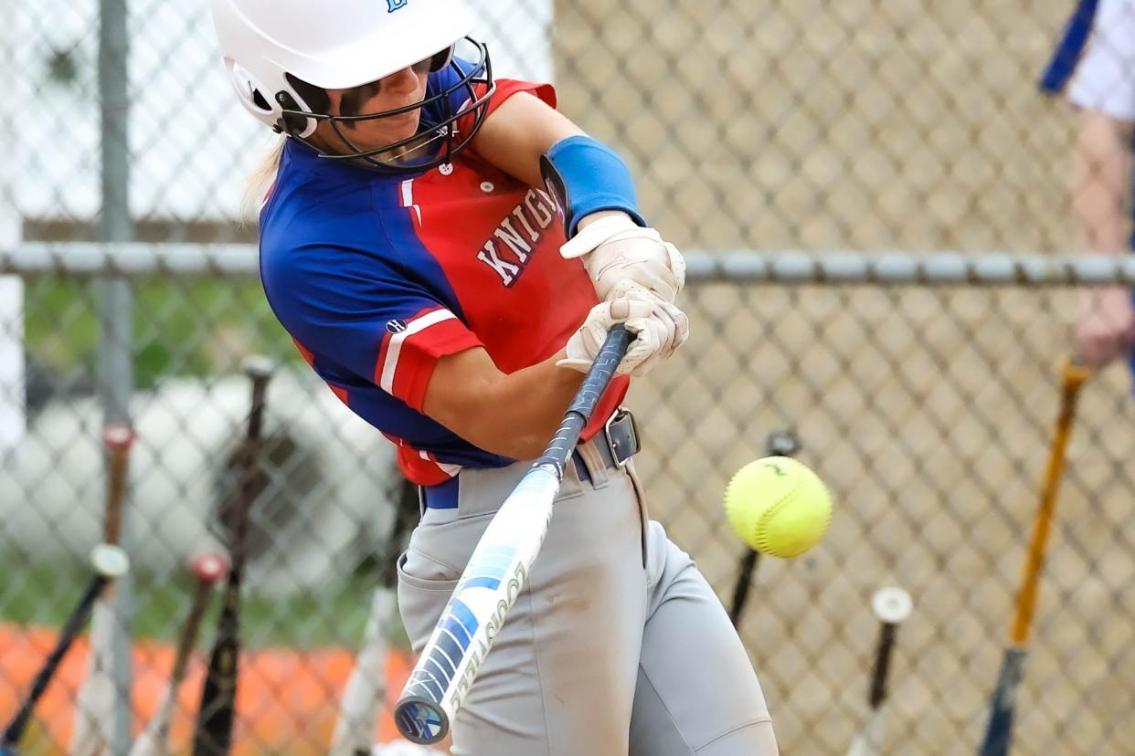 West Holmes standout Kenzie Woods rips this hit and finished with three hits in the win.