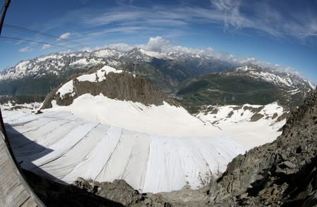 Parts of the Gurschengletscher glacier are covered with tarps in Andermatt
