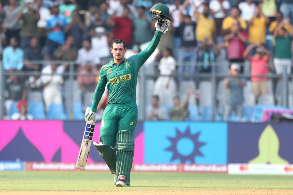 Quinton de Kock of South Africa celebrates after scoring a hundred during the ICC Men's Cricket World Cup 2023 match between South Africa and Bangladesh (Getty Images)