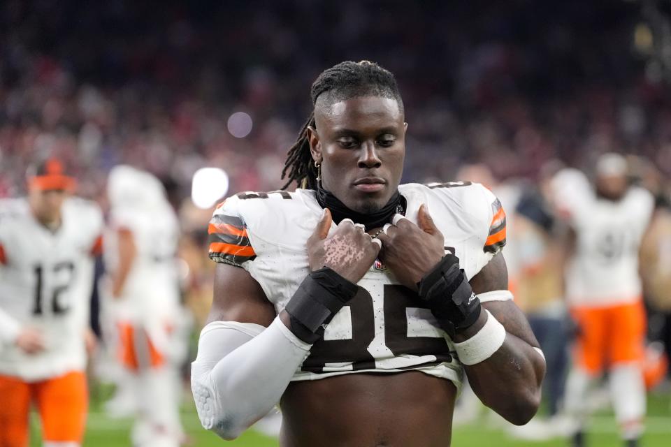 Cleveland Browns tight end David Njoku leaves the field after their loss against the Houston Texans in an NFL wild-card playoff football game Saturday, Jan. 13, 2024, in Houston.(AP Photo/David J. Phillip)