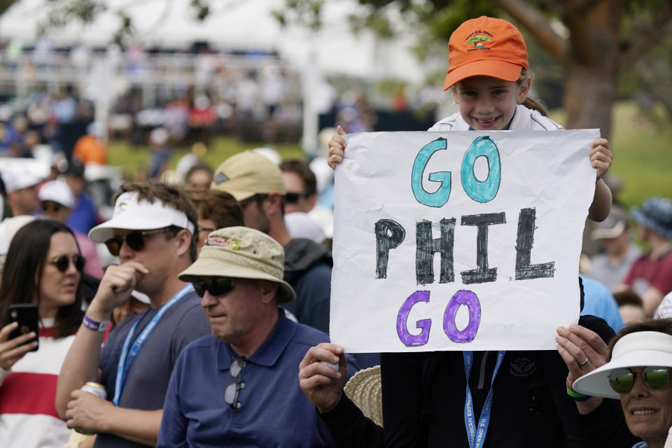 Fans cheer on Phil Mickelson along the seventh fairway during the second round of the U.S. Open Golf Championship, Friday, June 18, 2021, at Torrey Pines Golf Course in San Diego. (AP Photo/Marcio Jose Sanchez)