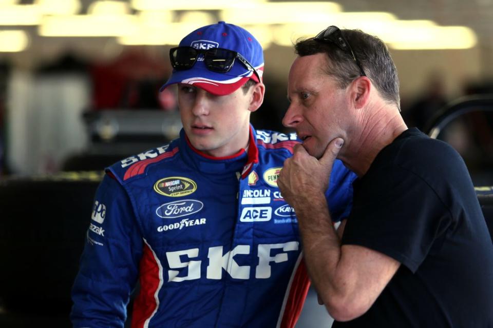 KANSAS CITY, KS - MAY 09: Ryan Blaney(L), driver of the #12 SKF Ford, talks to his father Dave Blaney, driver of the #77 Ford, during practice for the NASCAR Sprint Cup Series 5-Hour Energy 400 at Kansas Speedway on May 9, 2014 in Kansas City, Kansas. (Photo by Todd Warshaw/NASCAR via Getty Images)