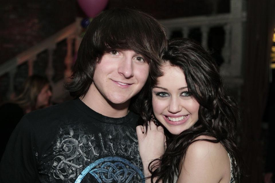 Mitchel Musso and Miley Cyrus in 2008 (Getty Images)