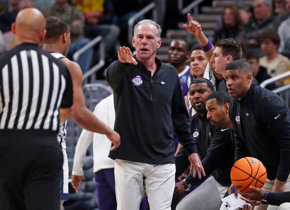 TCU Horned Frogs head coach Jamie Dixon talks to an official during NCAA Men’s Basketball Tournament game against the Utah State Aggies, Friday, March 22, 2024, at Gainbridge Fieldhouse in Indianapolis. Utah State Aggies won 88-72.