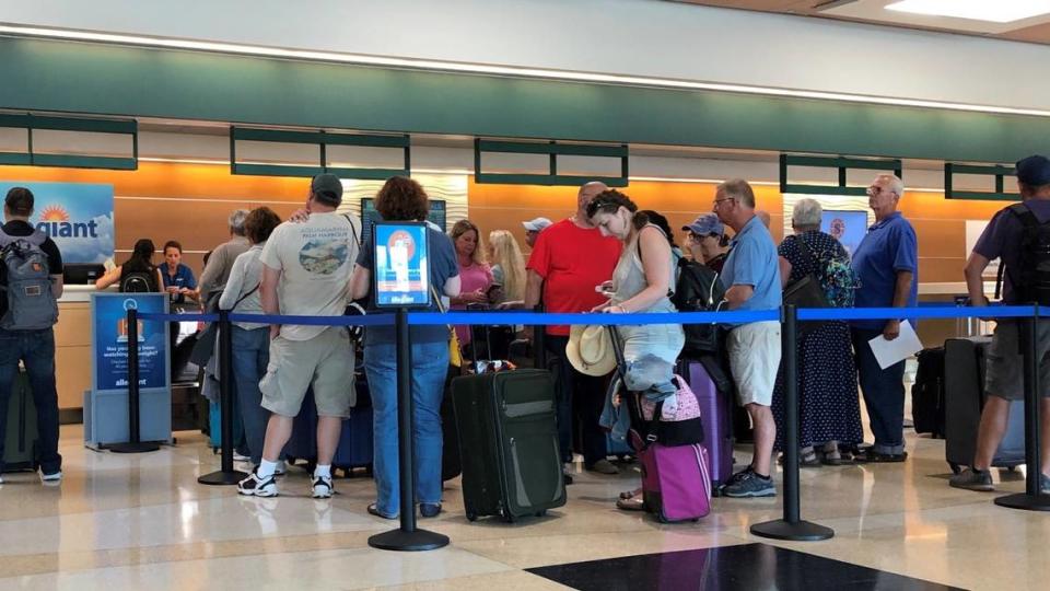 11/13/2019--Travelers line up at SRQ’s Allegiant ticket counter to check their bags. The low-cost carrier has helped drive passenger traffic at Sarasota Bradenton International Airport to record levels. This file photo was taken prior to the COVID-19 pandemic.
