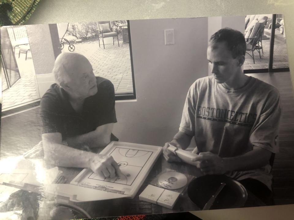 USC coach Andy Enfield, right, with his father Bill in 2012.