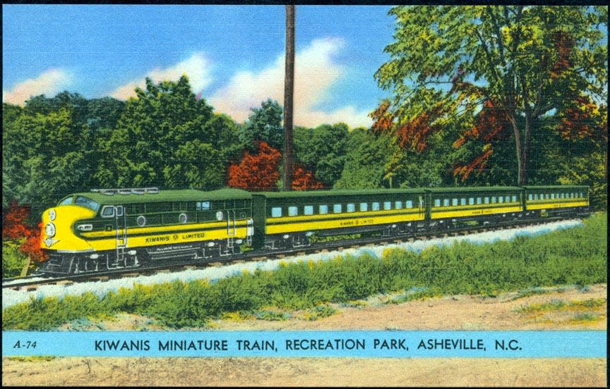 Colored, divided back postcard of the Kiwanis miniature train at Recreation Park, Asheville, NC. The train first began at the park in 1954 and was a financial success.