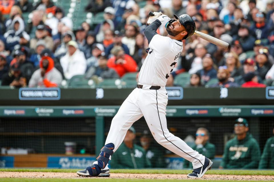 Detroit Tigers left fielder Riley Greene (31) bats against Oakland Athletics during the eighth inning of the home opening day at Comerica Park in Detroit on Friday, April 5, 2024.