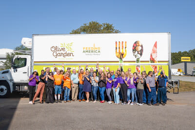 Staff from Feeding America, Kentucky’s Heartland celebrate the donation of their new food truck.