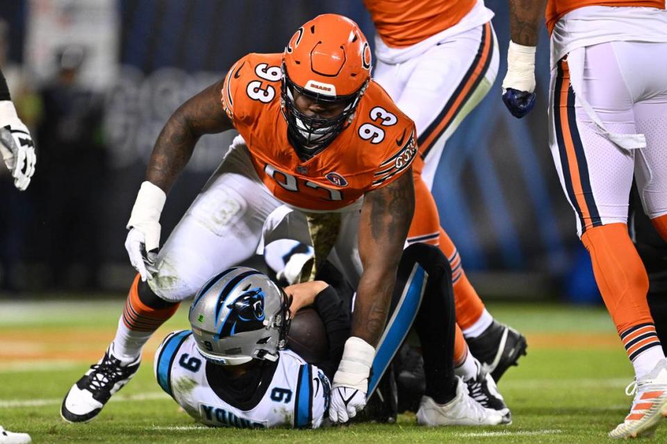 Chicago Bears defensive lineman Justin Jones (93) reacts after sacking Carolina Panthers quarterback Bryce Young (9) in the first half at Soldier Field. Chicago sacked Young three times and edged Carolina 16-13, dropping the Panthers to 1-8.