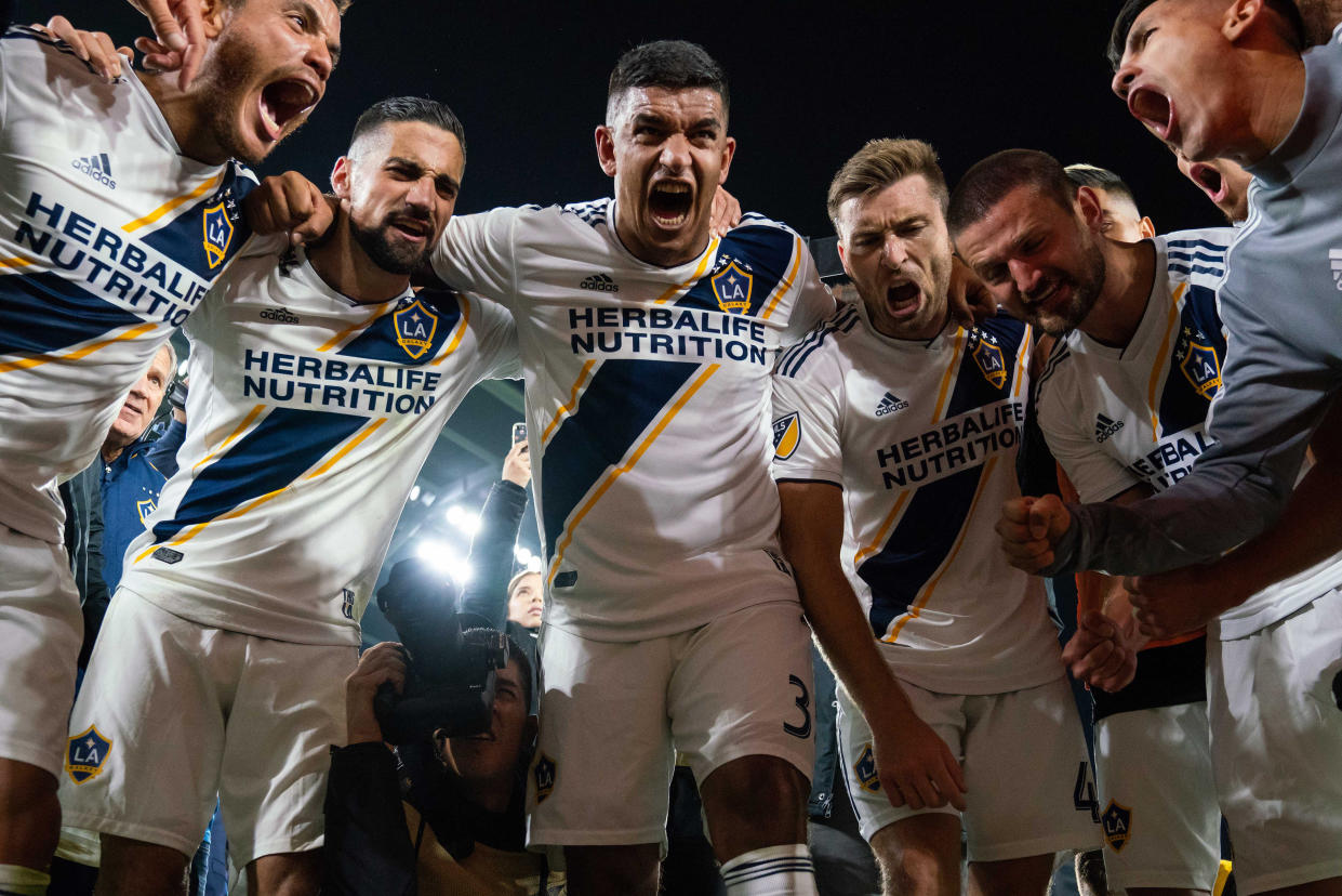 The LA Galaxy players aren't the only ones excited they'll face rival LAFC in the second round of the MLS Cup playoffs after beating Minnesota United 2-1 Sunday. (Brad Rempel/USA Today)