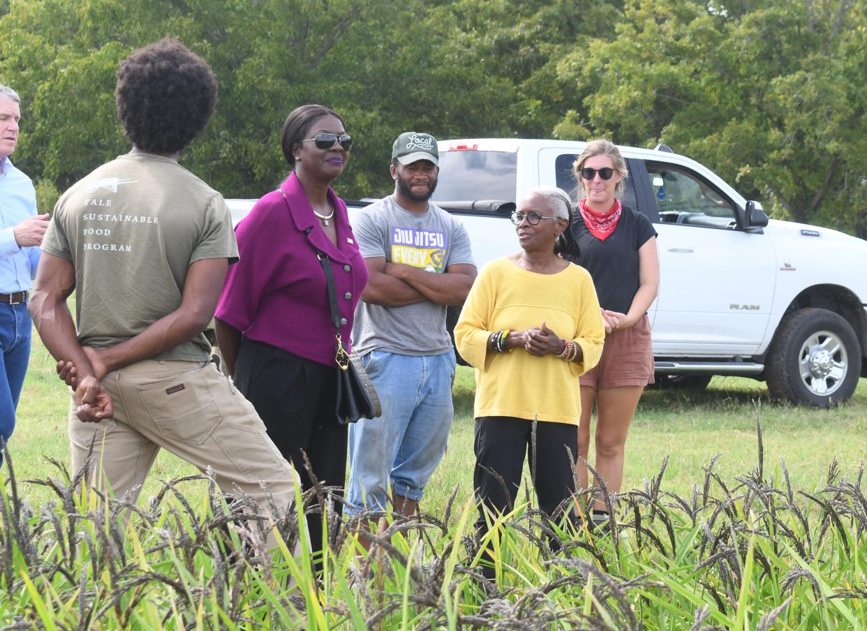 Dr. Chavonda Jacobs-Young (second from left), USDA undersecretary for research, education and economics and USDA’s Chief Scientist, visited with Konda Mason (front right), founder and president of Jubilee Justice. Jacobs-Young was inspired to visit the non-profit farm and learn about it's farming operations after one of her staff learned about it.
