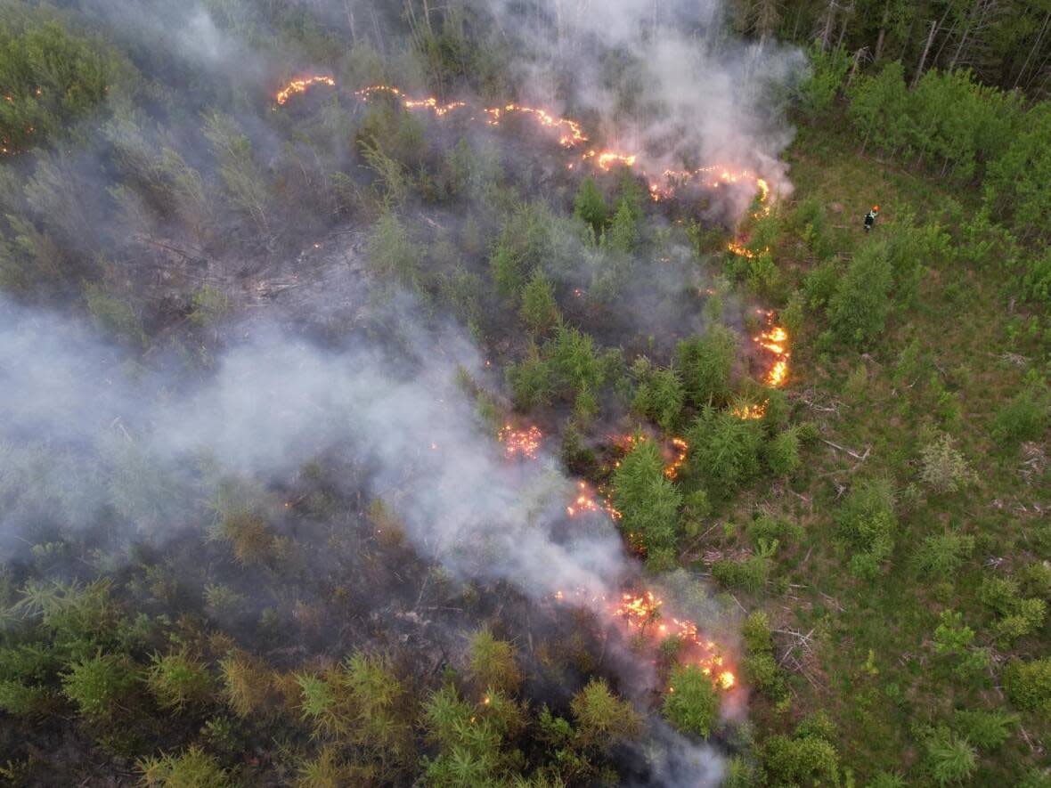 Capt. Mike Sherwood, of the Belleisle Valley Fire Department, used a drone to help follow a fast-moving fire last week and to help direct firefighters battling the blaze on the ground.  (Submitted by BVFD - image credit)