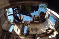 FILE PHOTO: Inside view of an abandoned 19th century manor in Goussainville-Vieux Pays, 20 kms (12 miles) north of Paris, September 9, 2013. REUTERS/Charles Platiau/File Photo