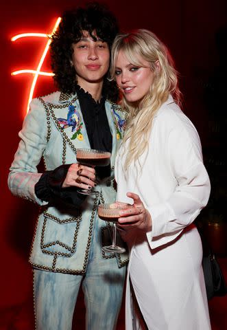<p>Kevin Mazur/VF24/WireImage for Vanity Fair</p> Towa Bird and Renee Rapp attend the 2024 Vanity Fair Oscar Party