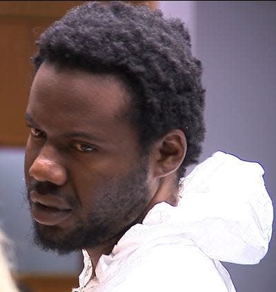 A man identified in court records as Wesny Clairsainvil, 29, of Providence, appears in District Court Thursday morning. Clairsainvil is accused of killing his sister and seriously injuring his mother early Wednesday morning in a knife attack.