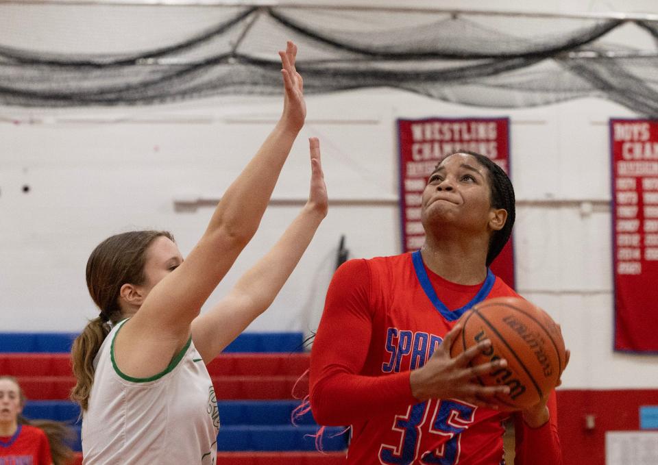 Ocean’s Gamila Betton drives to the basket as Brick’s Summer Fenwick tries to stop her. Ocean Township High School Girls Basketball dominates Brick High School in NJSIAA Central Jersey Group 3 first round game in Ocean Twp. on February 22,, 2024.