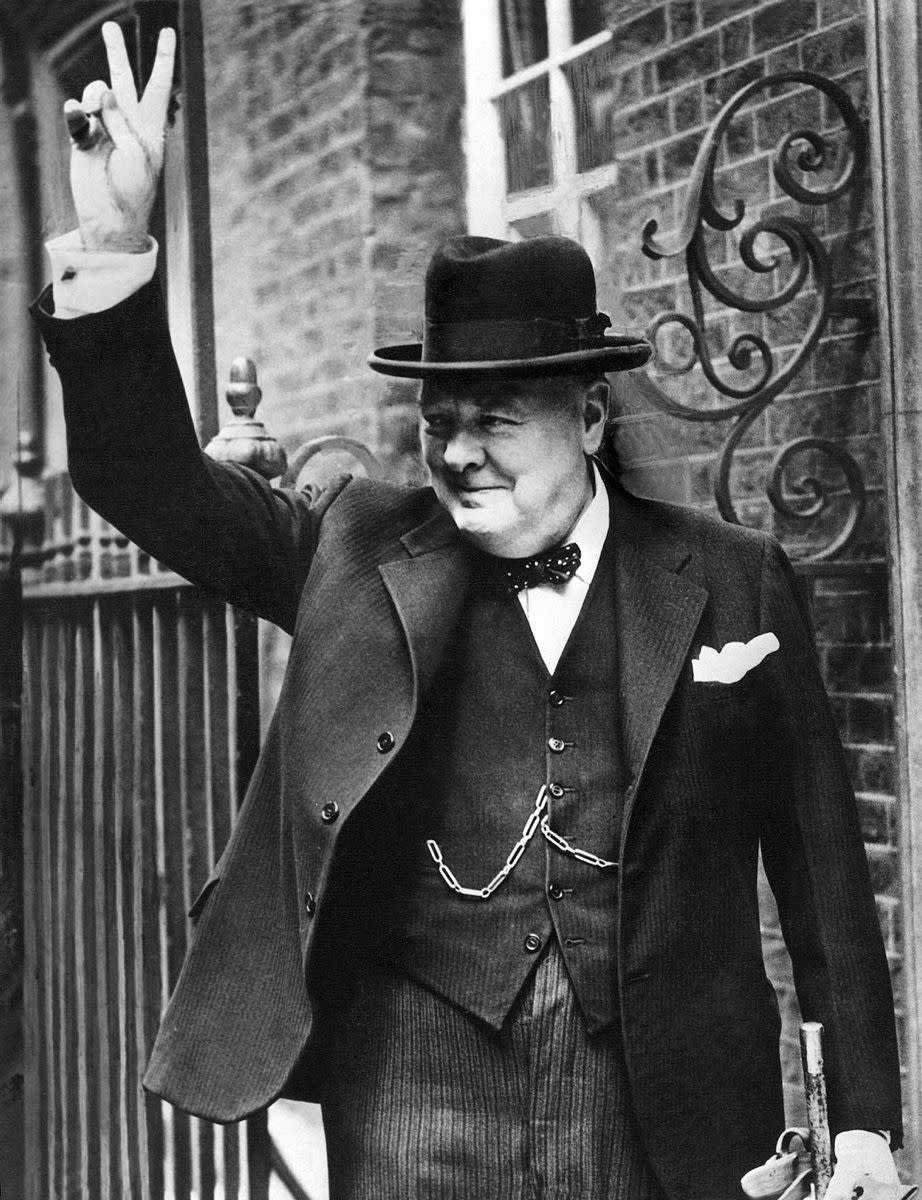 After the general election of 1951, Churchill returned to government and was appointed as Minister of Defense in October. The same month, Churchill also became Prime Minister once again and remained in position until 1955. In 1953, Churchill was knighted by Queen Elizabeth II. Here, Churchill is making his infamous "V" sign for "victory."