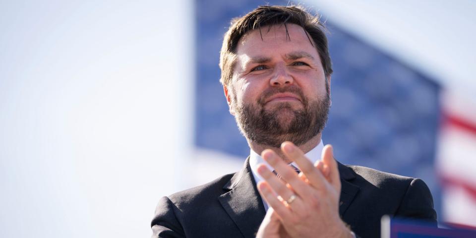 JD Vance arrives onstage during a rally hosted by former President Donald Trump