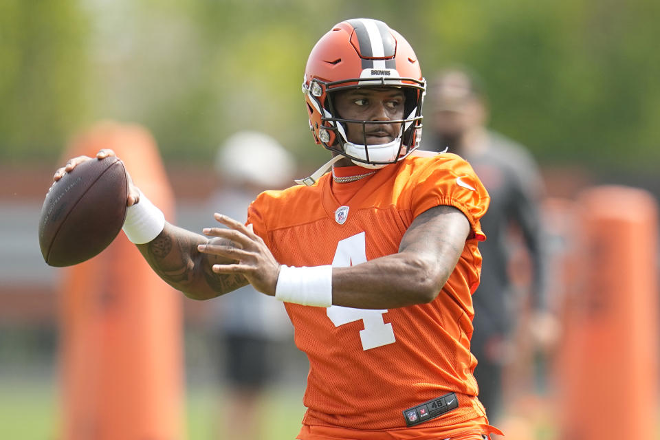 Cleveland Browns quarterback Deshaun Watson (4) warms up during NFL football practice, Wednesday, May 24, 2023, in Berea, Ohio. (AP Photo/Sue Ogrocki)