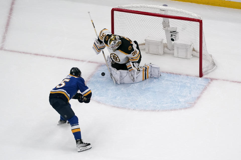 Boston Bruins goaltender Linus Ullmark (35) stops a shot from St. Louis Blues' Jakub Vrana during a shootout of an NHL hockey game Sunday, April 2, 2023, in St. Louis. (AP Photo/Jeff Roberson)