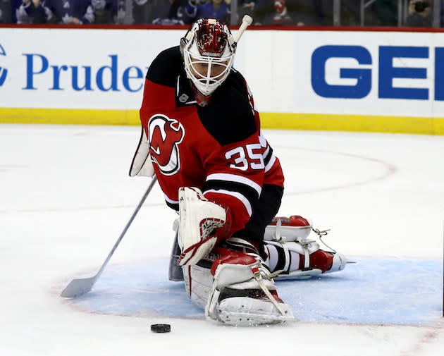 NEWARK, NJ - NOVEMBER 23: Cory Schneider #35 of the New Jersey Devils stops a shot by Nikita Soshnikov #26 during a shootout to win the game on November 23, 2016 at Prudential Center in Newark, New Jersey.The New Jersey Devils defeated the Toronto Maple Leafs 5-4 in an overtime shootout. (Photo by Elsa/Getty Images)