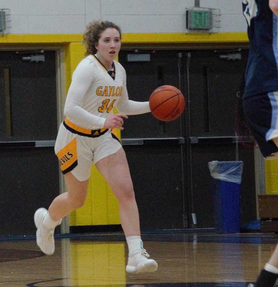 Avery Parker pushes the ball up the floor during a high school basketball matchup between Gaylord and Petoskey on Friday, February 4 in Gaylord, Mich.