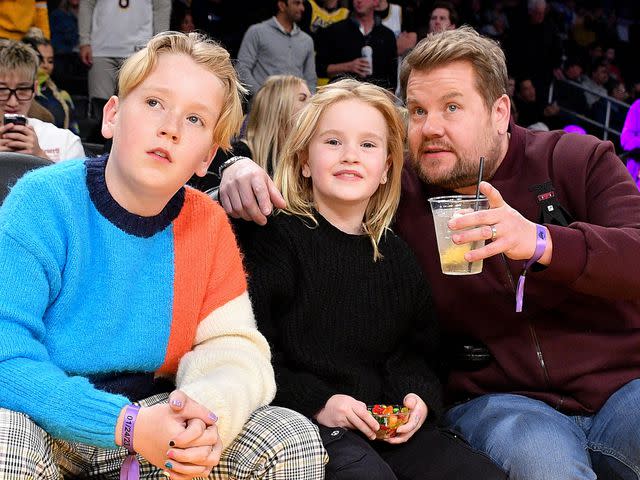 Allen Berezovsky/Getty James Corden (R) and his kids Max Corden (L) and Carey Corden attend a basketball game between the Los Angeles Lakers and the Los Angeles Clippers at Crypto.com Arena on January 24, 2023 in Los Angeles, California