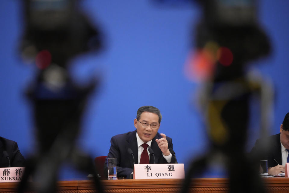 Chinese Premier Li Qiang speaks during a press conference held after the closing ceremony for China's National People's Congress (NPC) at the Great Hall of the People in Beijing, Monday, March 13, 2023. (AP Photo/Mark Schiefelbein)