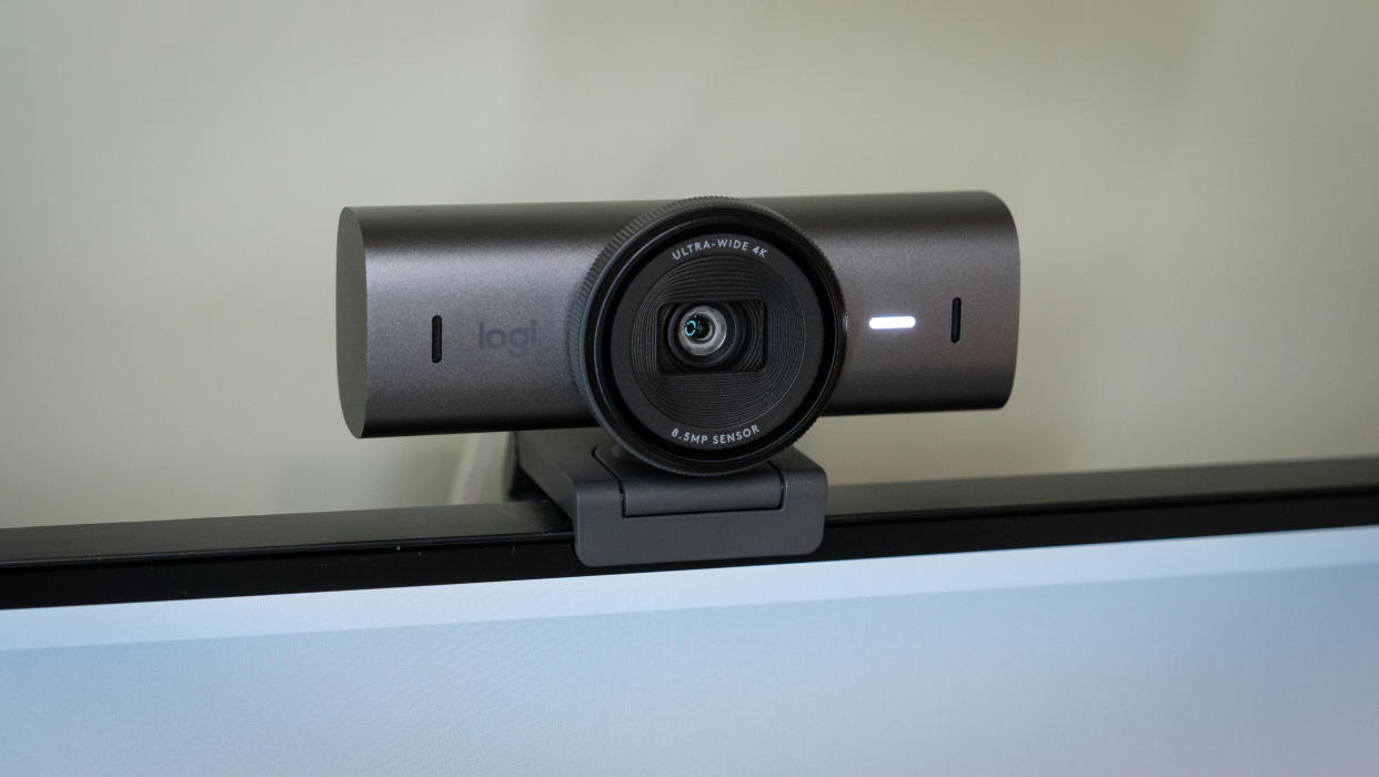  Logitech MX Brio webcam on top of a monitor. 