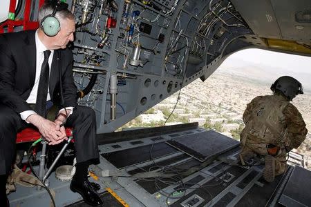 FILE PHOTO: U.S. Defense Secretary James Mattis looks out over Kabul as he arrives via helicopter at Resolute Support headquarters in Kabul, Afghanistan April 24, 2017. REUTERS/Jonathan Ernst/File Photo