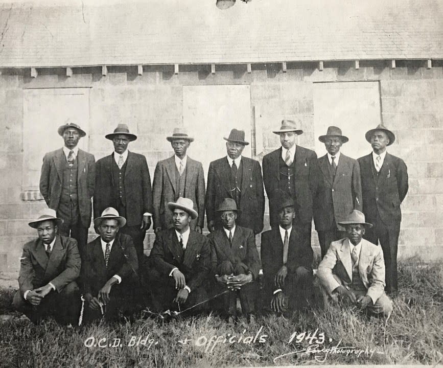 <em>1943 Oceana Civil Defense Building and officials (Photo courtesy of Edna Hawkins Hendrix)</em>.