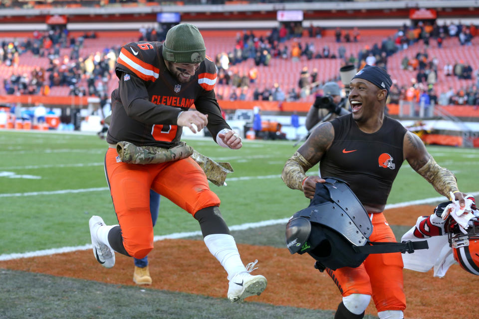 Browns quarterback Baker Mayfield (6) and safety Damarious Randall were all smiles after Cleveland’s 28-16 victory on Sunday against Atlanta. (Getty Images)