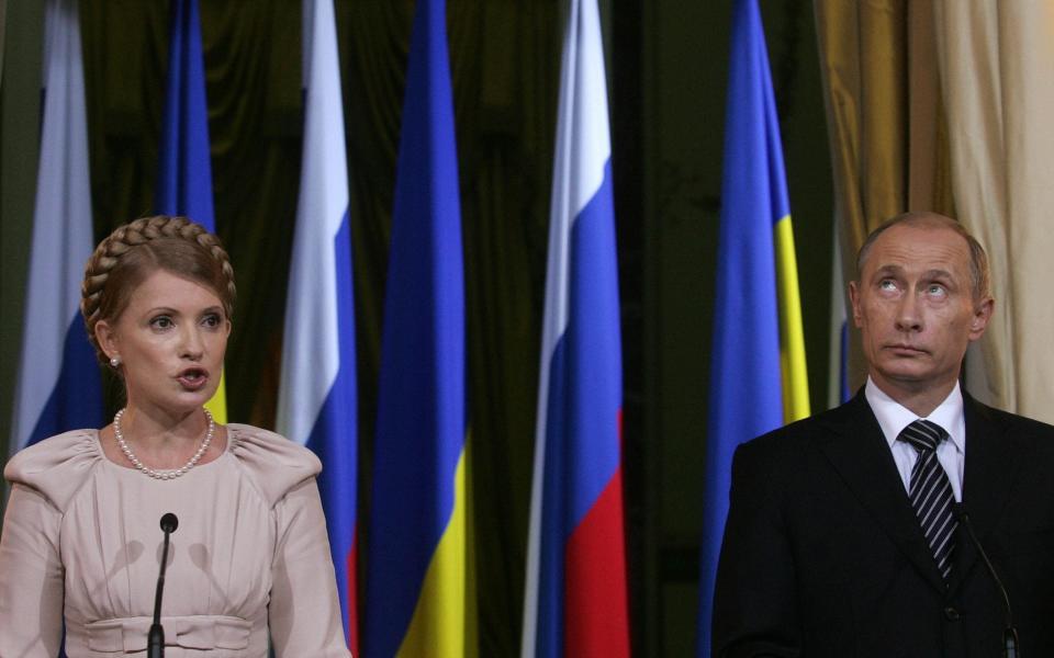 Vladimir Putin and Ukrainian Prime Minister Yulia Tymoshenko at a press conference after talks in Moscow on June 28, 2008 - AFP/AFP