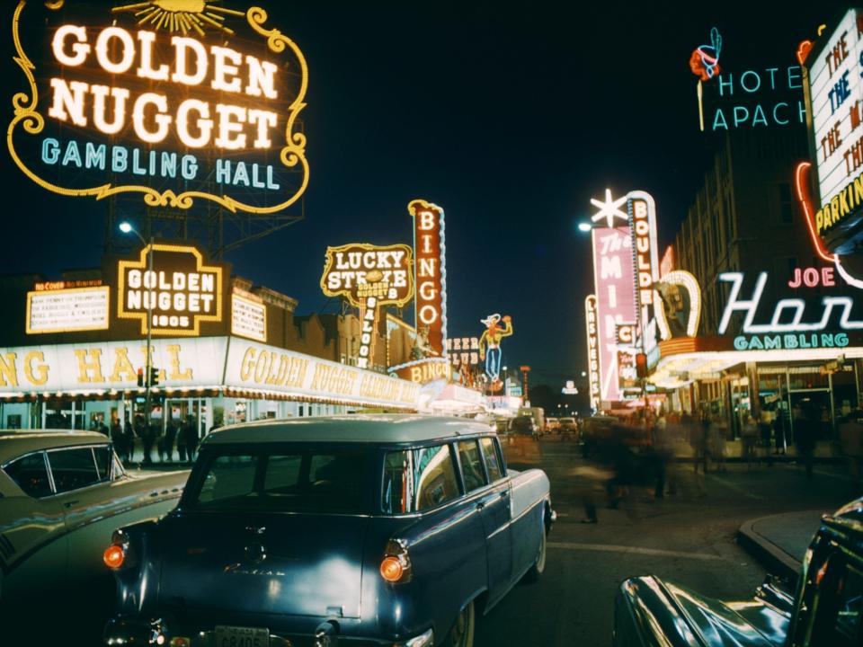 A general view of Downtown Las Vegas from Fremont Street looking at the Golden Nugget Gambling Hall, The Mint, Pioneer Club, Lucky Strike, The Las Vegas Club and The Hotel Apache circa 1958 in Las Vegas, Nevada