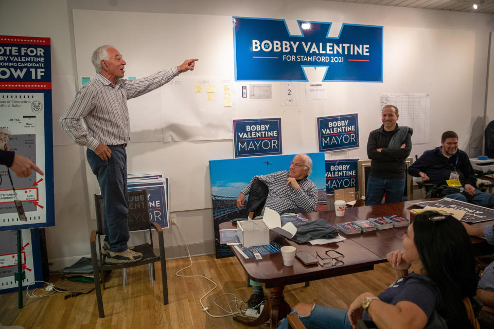 Bobby Valentine stands on a chair as he speaks at his campaign headquarters in Stamford, Conn.