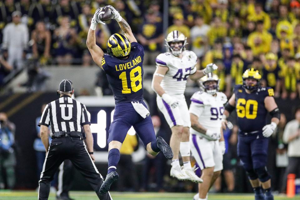 Michigan tight end Colston Loveland makes a catch against Washington during the second half of U-M's 34-13 win in the College Football Playoff national championship game in Houston on Monday, Jan. 8, 2024.