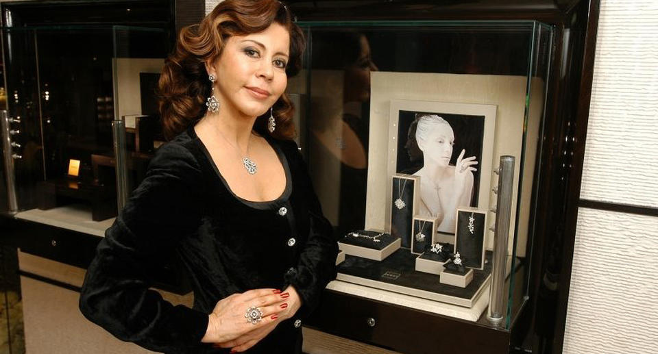 Dilek Ertek poses in front of a Tiffany's window.